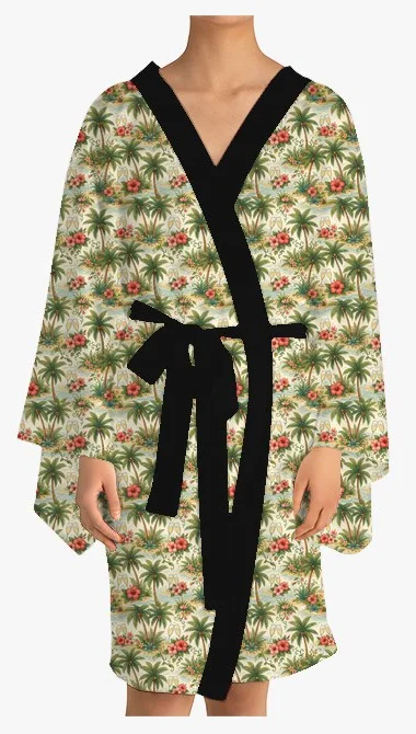 Kimono printed with a painted scene of palm trees, hibiscus flowers and champagne glasses